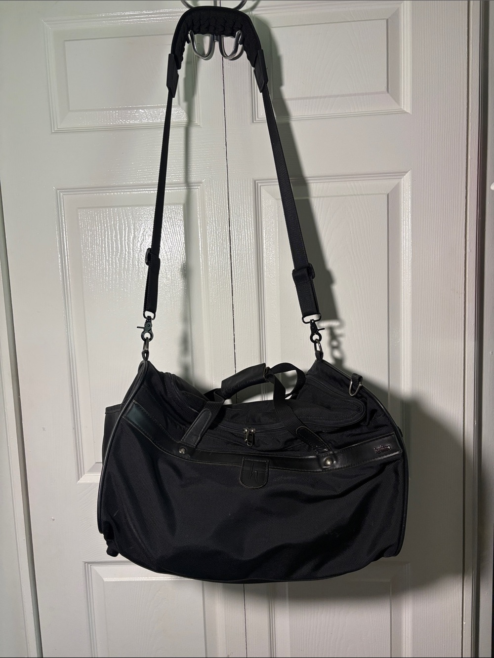 Hartmann zip around nylon and leather duffle style bag.